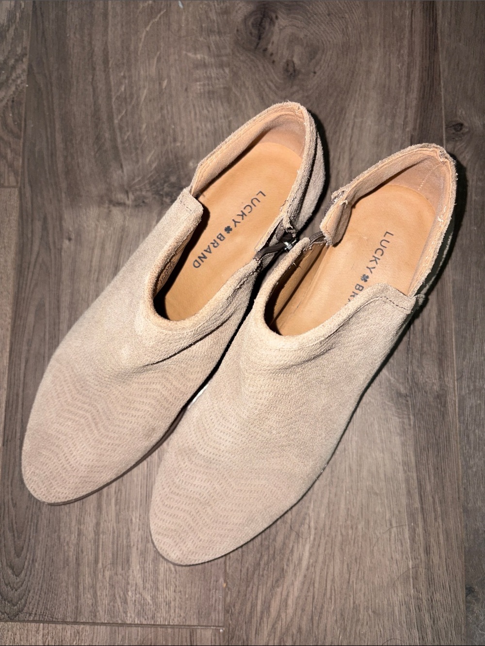 Lucky Brand women’s Slip-On Suede ankle boot in Light Beige